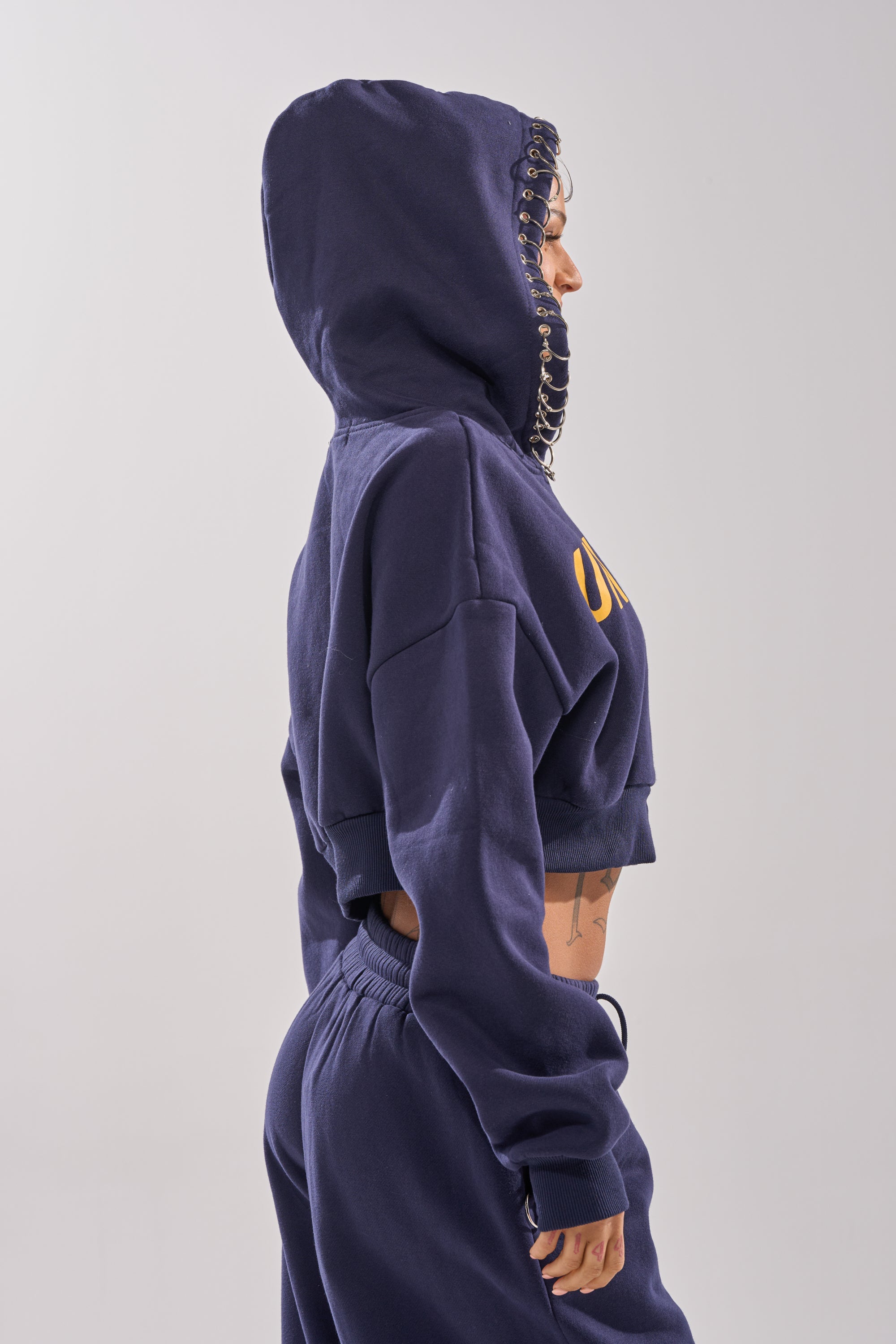 UNTAMED METAL RING SWEATSHIRT